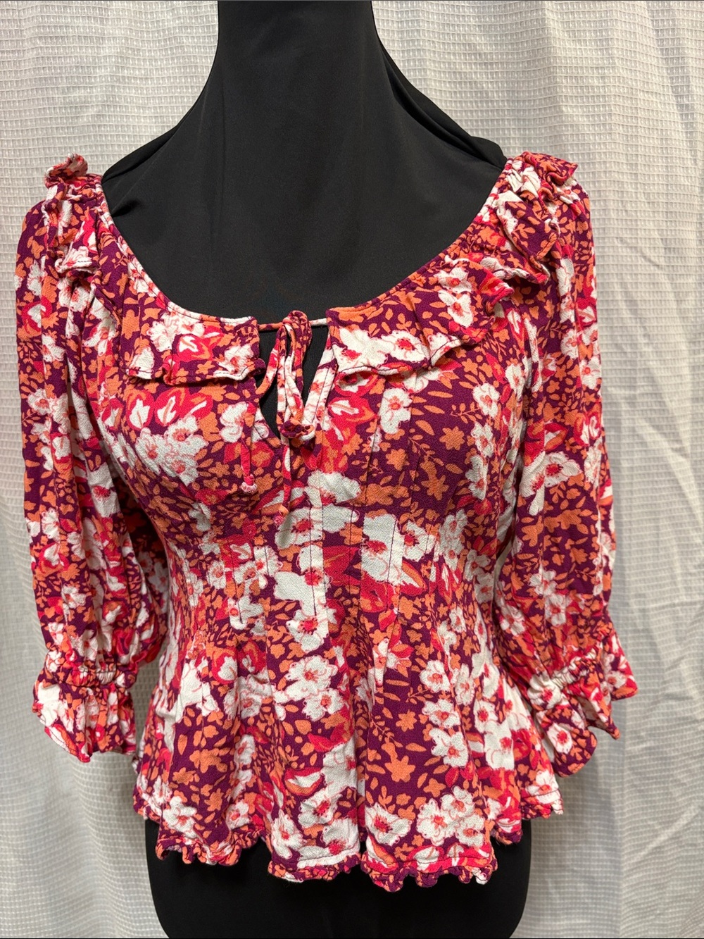 Floral Peplum Blouse with Ruffle Tie Neck - Red/Pink
